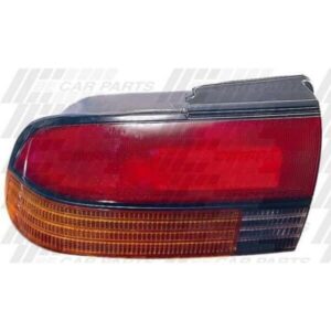 Mitsubishi Magna Tr 1991 - 94 Rear Lamp - Lefthand - Red/Amber/Clear - Black Strip