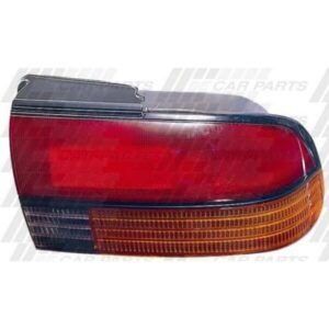Mitsubishi Magna Tr 1991 - 94 Rear Lamp - Righthand - Red/Amber/Clear - Black Strip